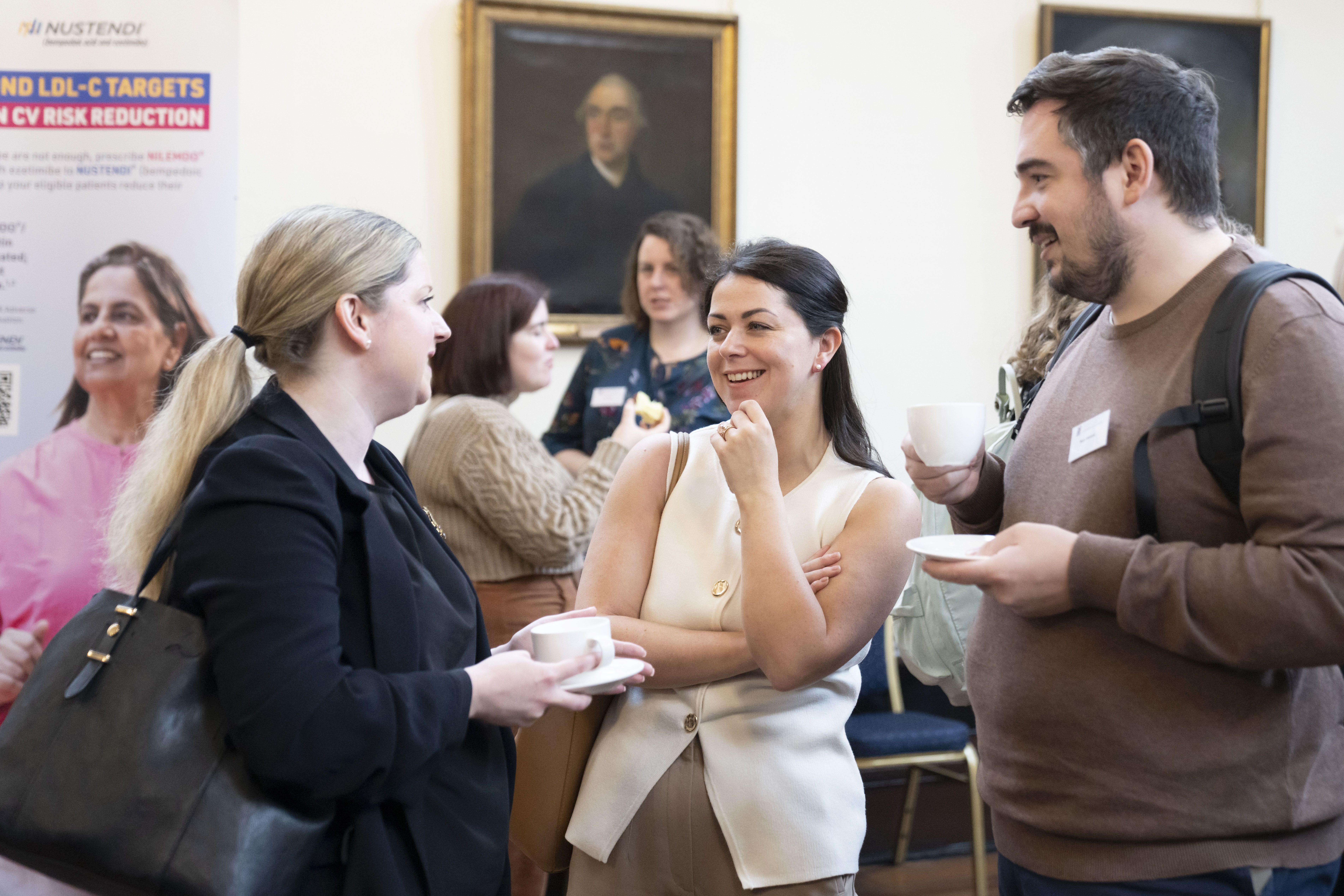 People socialising at the conference